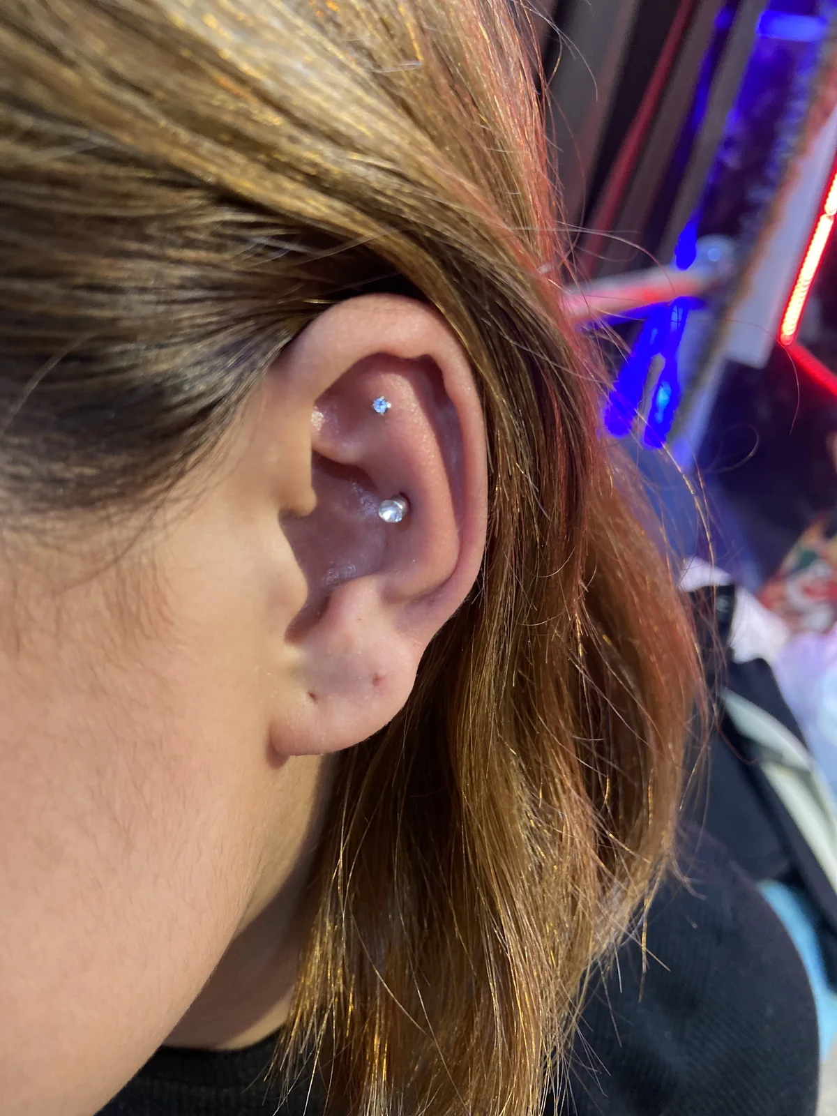 Ear piercing work at Sid Ink Tattoo, Sarojini Nagar Delhi