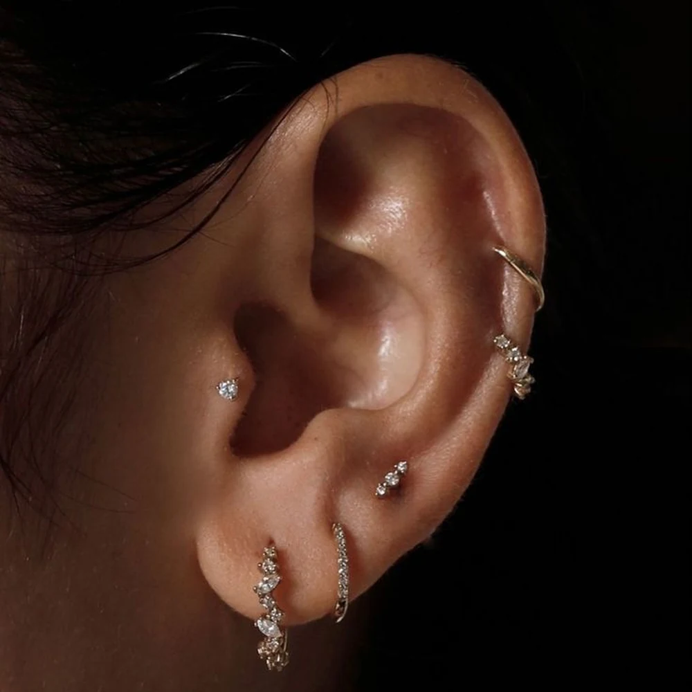 Close-up of a professional ear piercing at Sid Ink Tattoo piercing studio in Sarojini Nagar